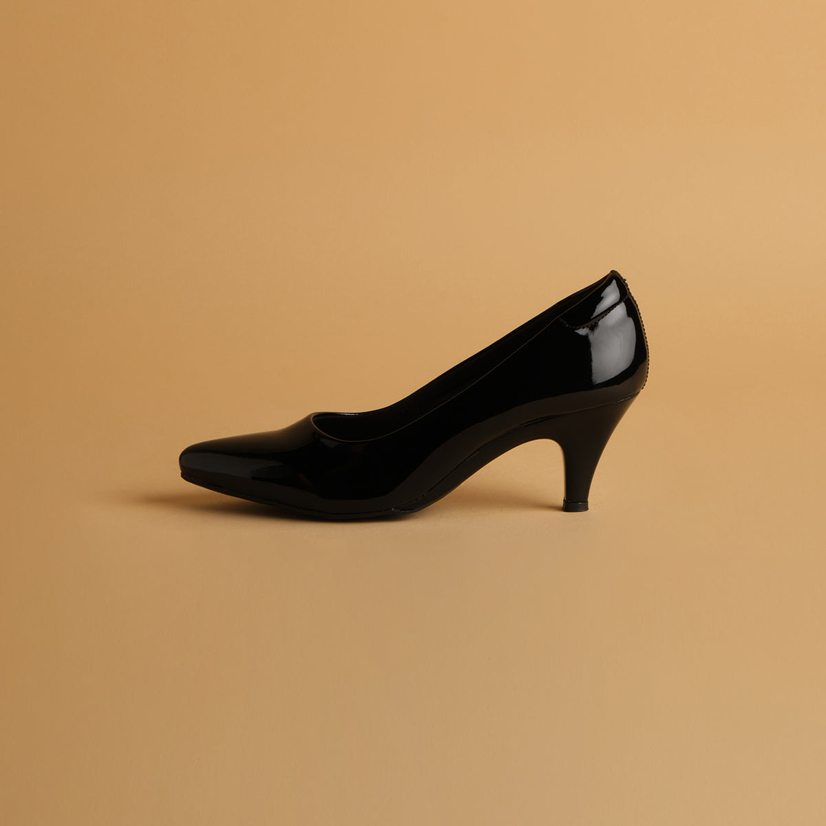 Camelia Patent Pumps