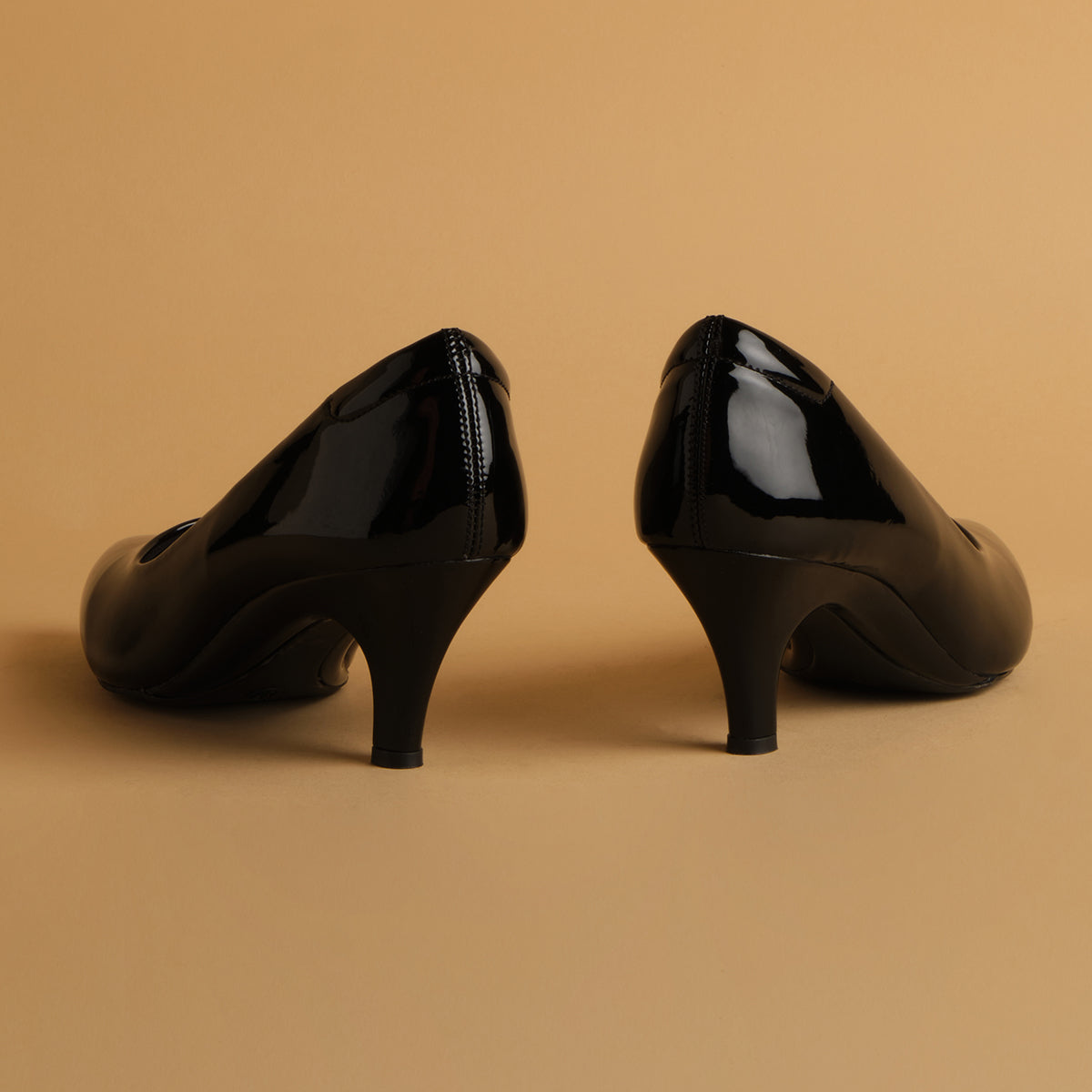 Camelia Patent Pumps